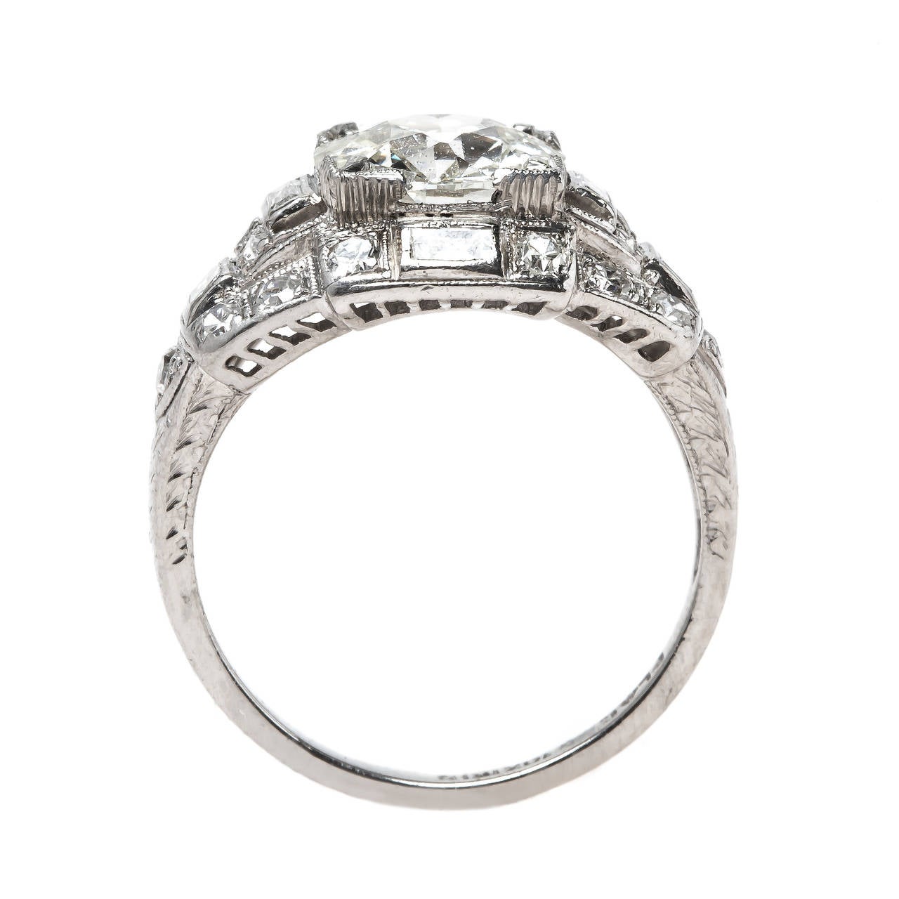 Casablanca is a fabulous authentic Art Deco era (circa 1930) diamond engagement ring made from platinum and centering a box-set 1.86ct GIA certified Old European Brilliant Cut diamond graded K color and SI1 clarity. Everything about this ring