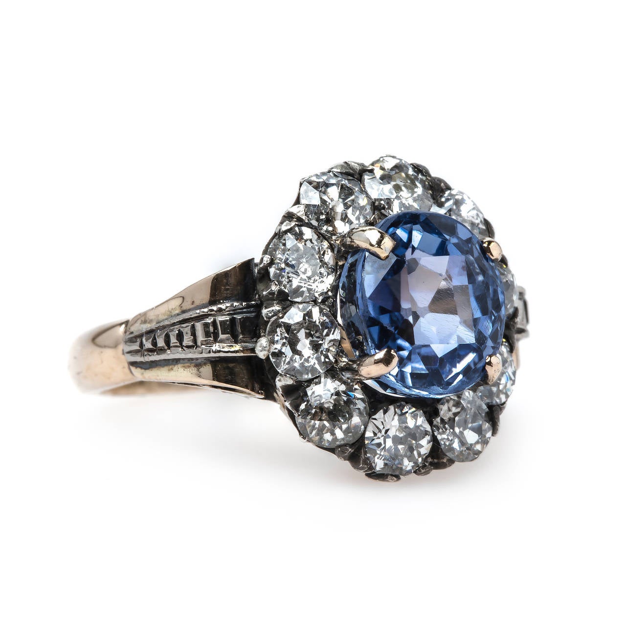 Victorian Sapphire Engagement Ring with Old Mine Cut Diamond Halo