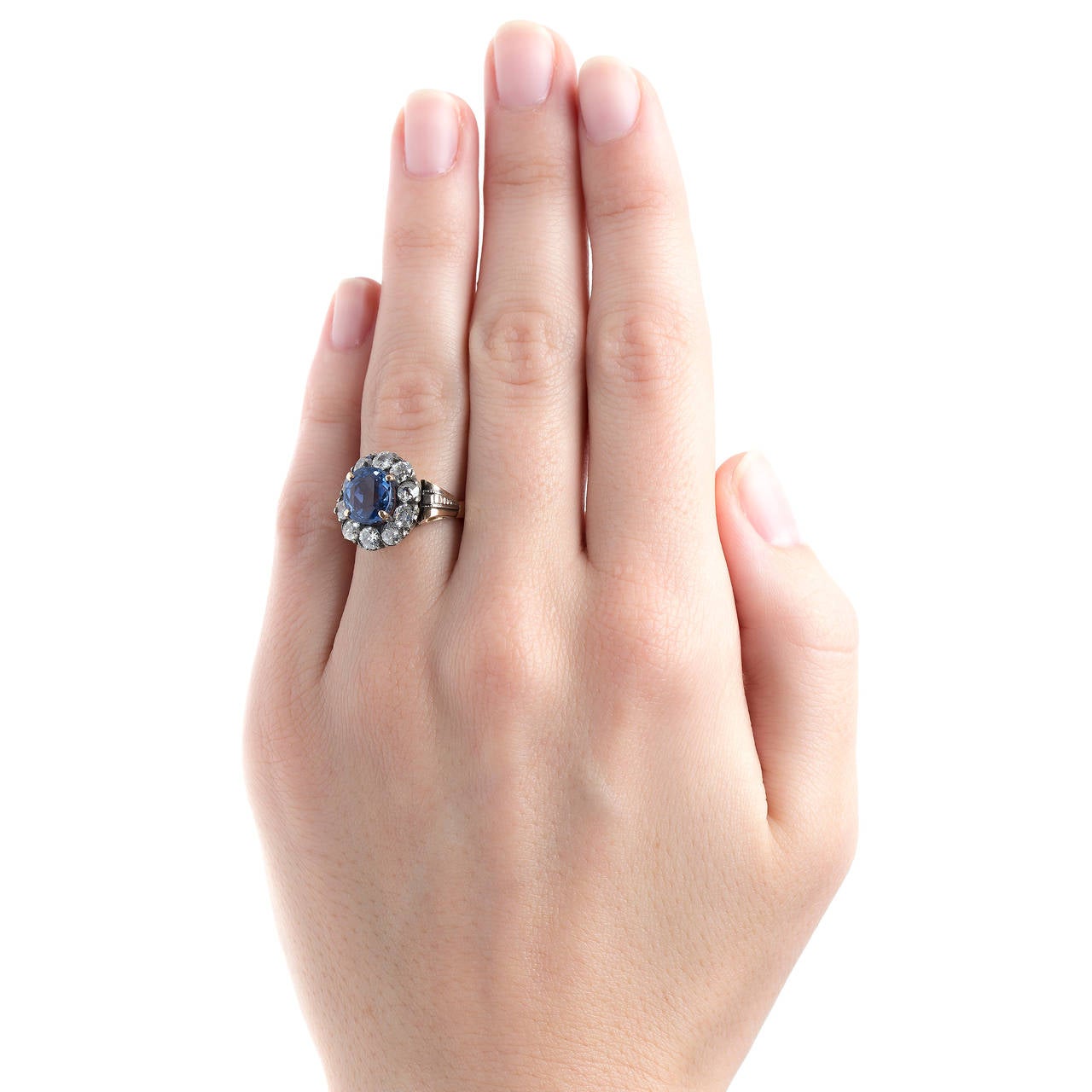 Whitewater is a favorite here at T&H! The show-stopping authentic Victorian era (circa 1880) silver topped 14k rose gold ring centers 3.55ct oval natural sapphire accompanied by a Guild Laboratories certificate stating the sapphire is unheated with
