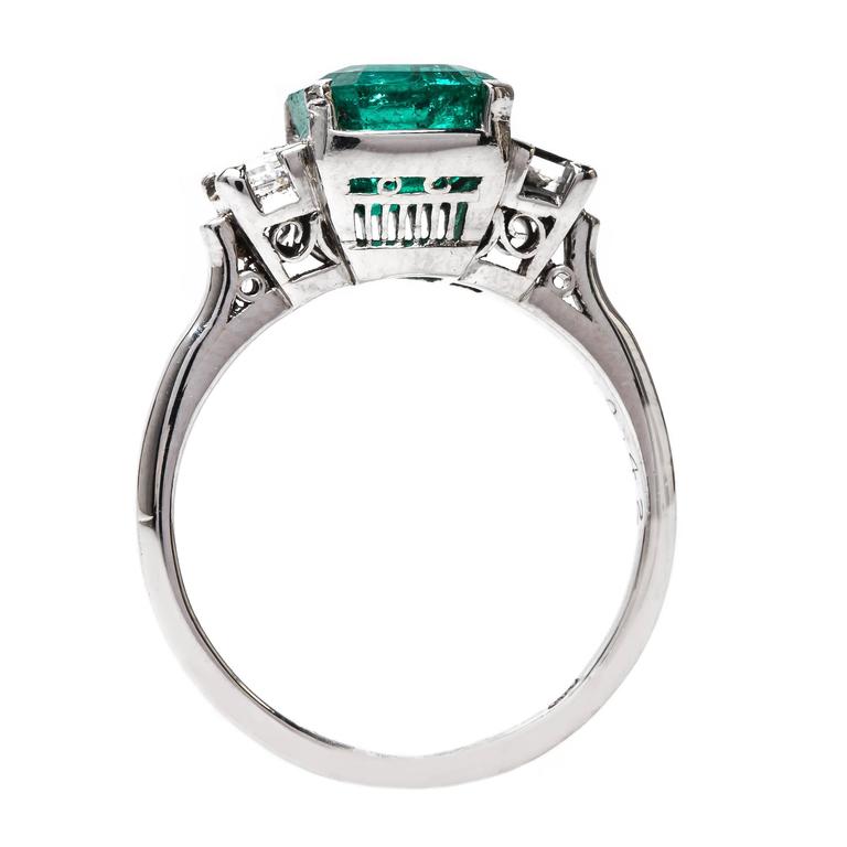 Bold Modern Era Emerald Ring with Square Step Cut Diamonds at 1stDibs