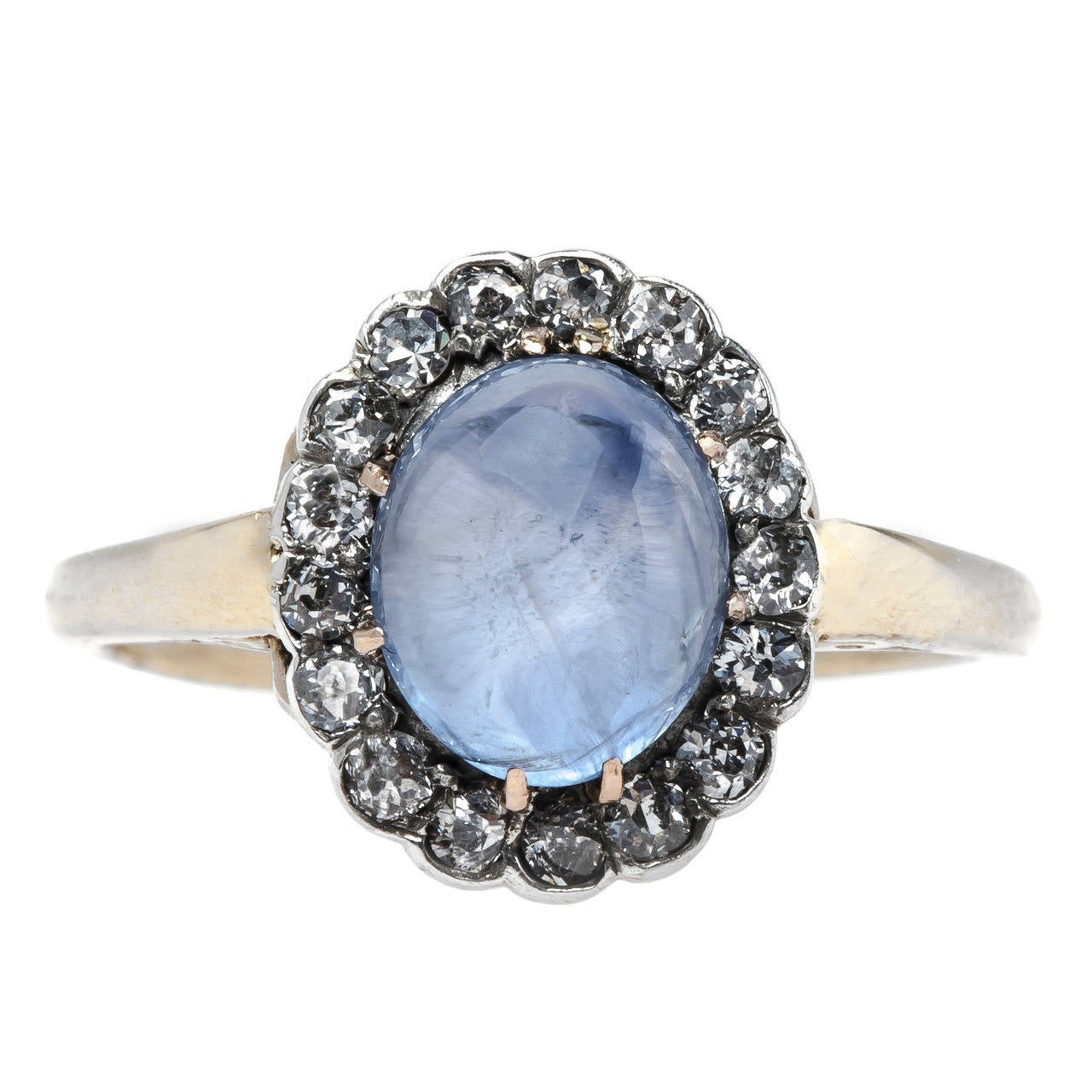 Dreamy Oval Cabochon Sapphire Engagement Ring with Diamond Halo