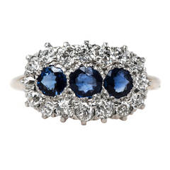 Timeless and Unique Victorian Era Sapphire Ring with Glittering Halo