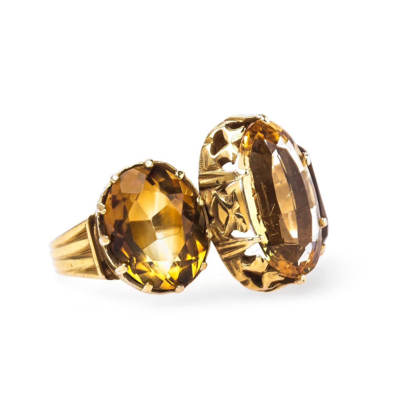 Sawmill is a fabulous authentic Victorian era (circa 1880) 14k yellow gold three-stone citrine ring centering a six-prong set elongated Oval light yellow citrine gauged at 2.85ct and flanked on either side by two Oval citrines both saturated a