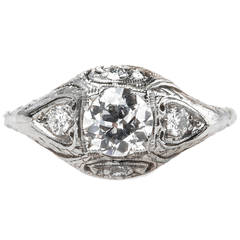 Enchanting Art Deco Engagement Ring with Floral Engraving