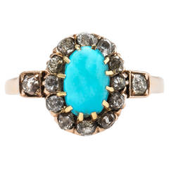 Antique Striking Victorian Era Turquoise Engagement Ring with Old Mine Cut Diamond Halo