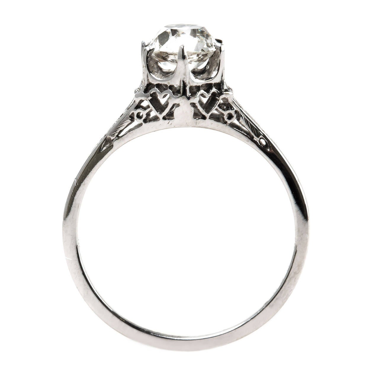 Romantic Edwardian Solitaire Engagement Ring with Heart-Shaped Metalwork 1