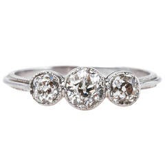 Delicate Edwardian Three Stone Diamond Platinum Engagement Ring