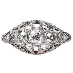 Elegant Edwardian Diamond Platinum Three-Stone Engagement Ring