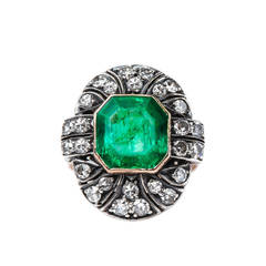 Gleaming Art Deco 4.00 Carat Colombian Emerald Diamond Gold Cocktail Ring