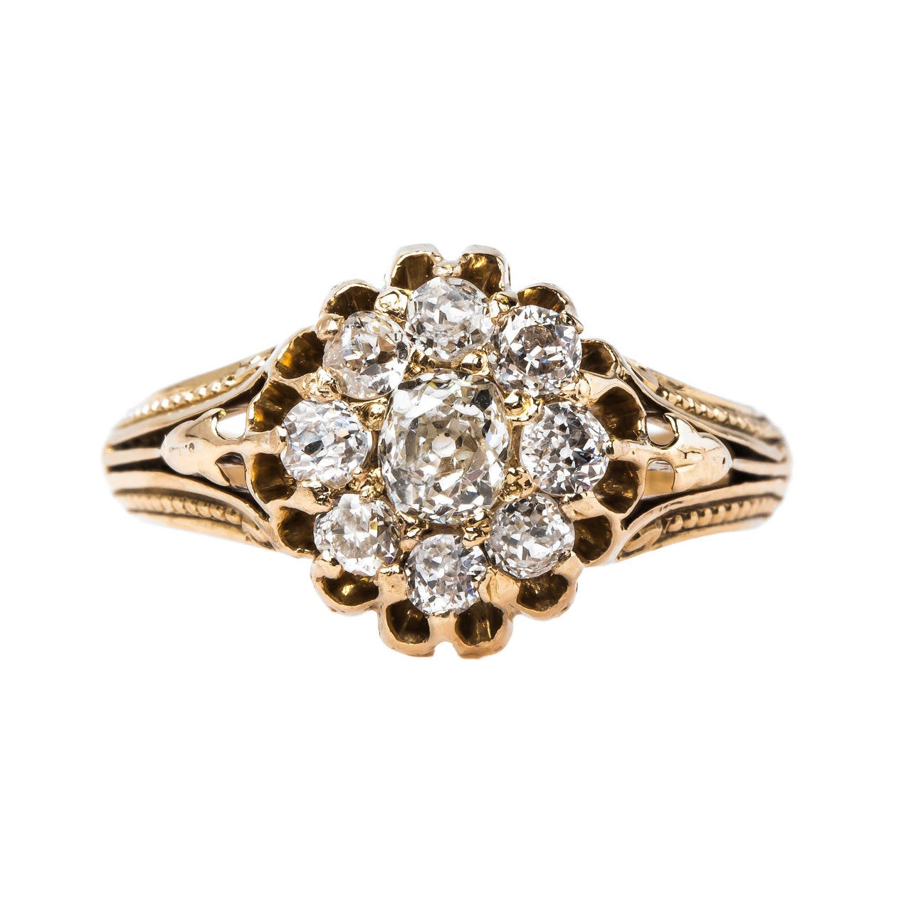 Intriguing Victorian Era Yellow Gold Cluster Ring with Old Mine Cut Diamonds For Sale