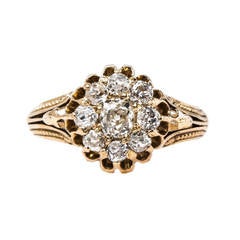 Intriguing Victorian Era Yellow Gold Cluster Ring with Old Mine Cut Diamonds