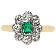 Late Victorian Emerald Diamond Halo Platinum Engagement Ring