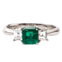 Contemporary Platinum Emerald Diamond Engagement Ring