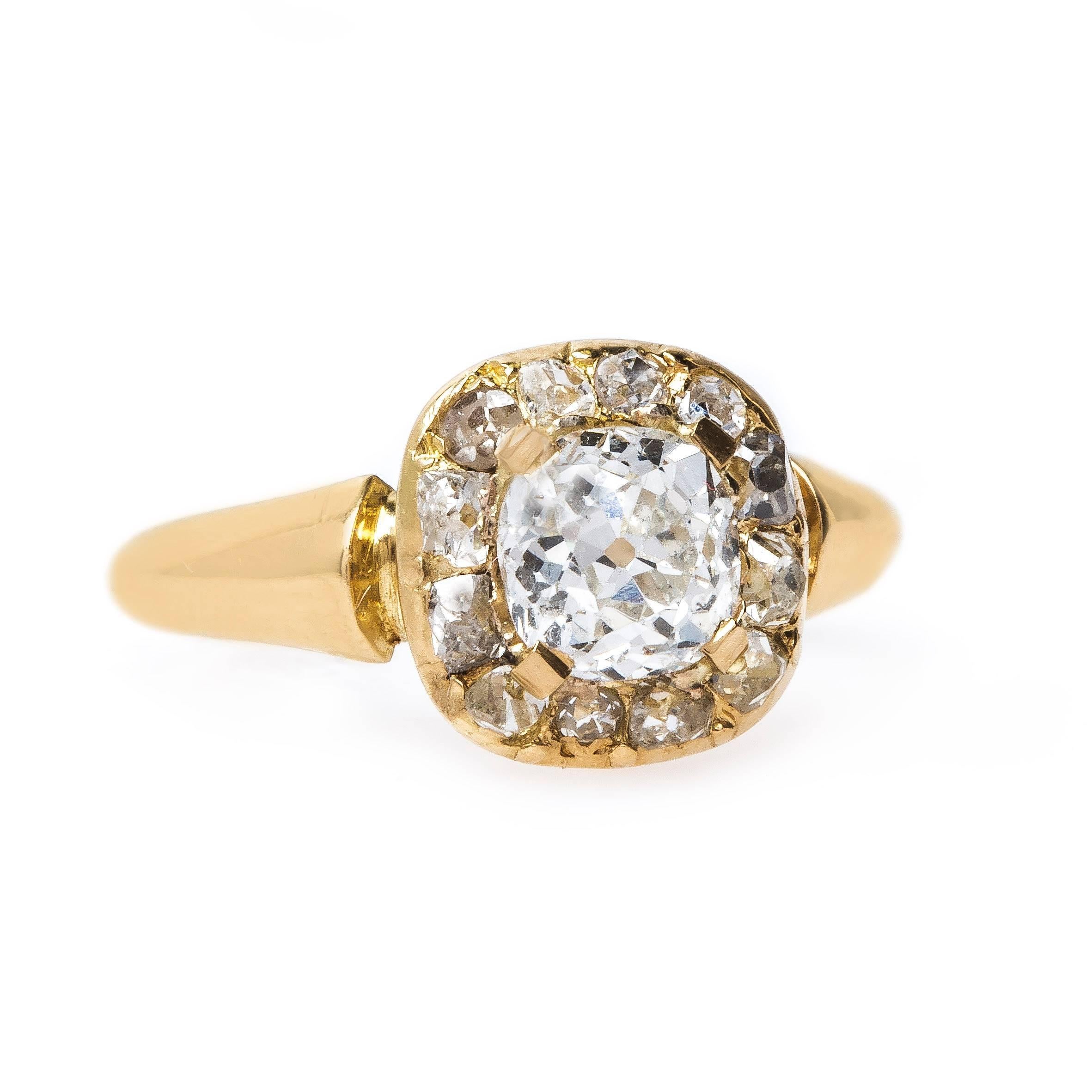 Tribeca is an alluring, one-of-a-kind Victorian era (circa 1890) 18k yellow gold antique engagement ring. This Victorian stunner centers a simple four-prong set 0.92ct EGL certified Old Mine Brilliant Cut diamond graded H color and SI1 clarity. A