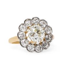 Elegant Victorian 1.68 Carat Diamond Gold Halo Engagement Ring