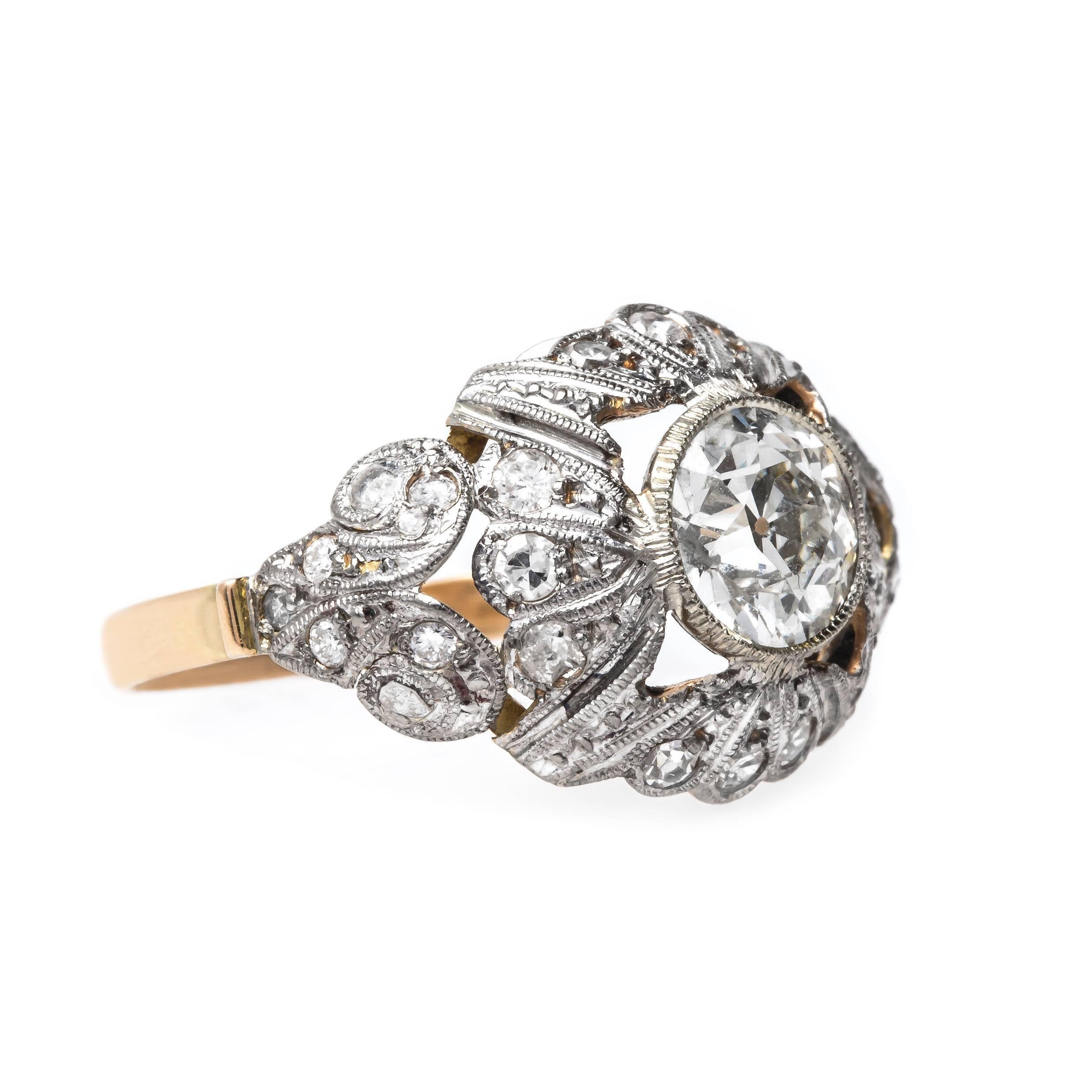 Gatewood is a fabulous one-of-a-kind, authentic Art Nouveau (circa 1910) platinum and 18k yellow gold ring accompanied with extremely coveted European Hallmarks on the outside shank. The ring centers a bezel set 1.08ct EGL certified Old European Cut