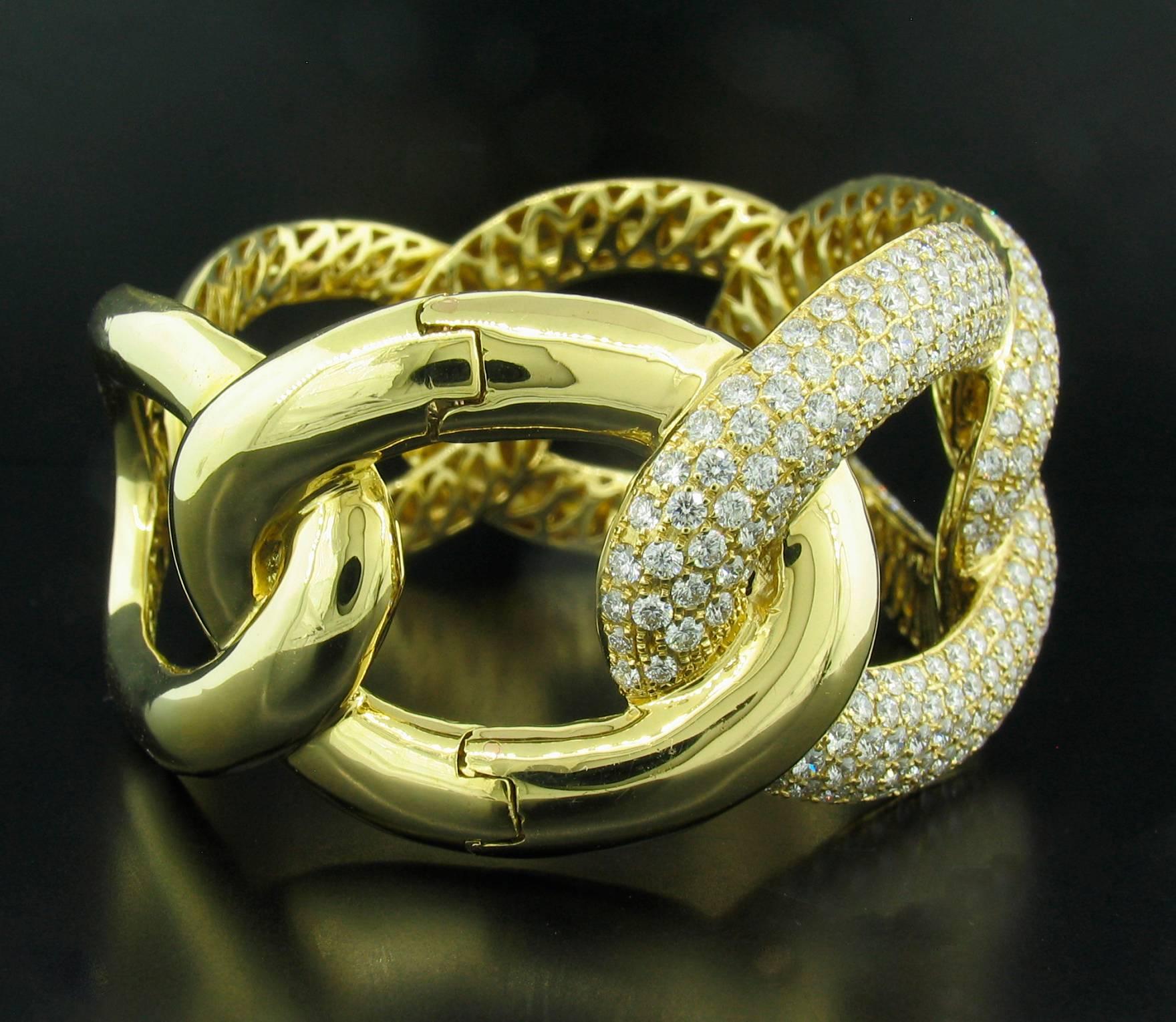 White Diamond and Gold Link Hinged Cuff features 9.37cts of Diamonds G-H in color and VS in clarity are pave set in 18k yellow gold.  Reverse of bracelet features detailed open work on the back.  By Damasco, Spain.