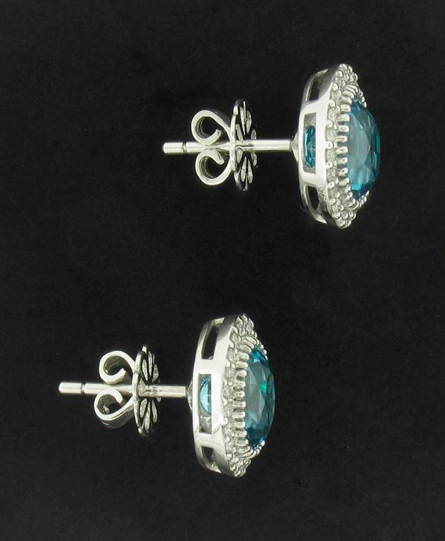 Natural Blue Zircon And Diamond Stud Earrings For At 1stdibs Natural Blue Zircon Stud Earrings Feature Oval Zircons Weighing A Total Of 6 96 Carats With