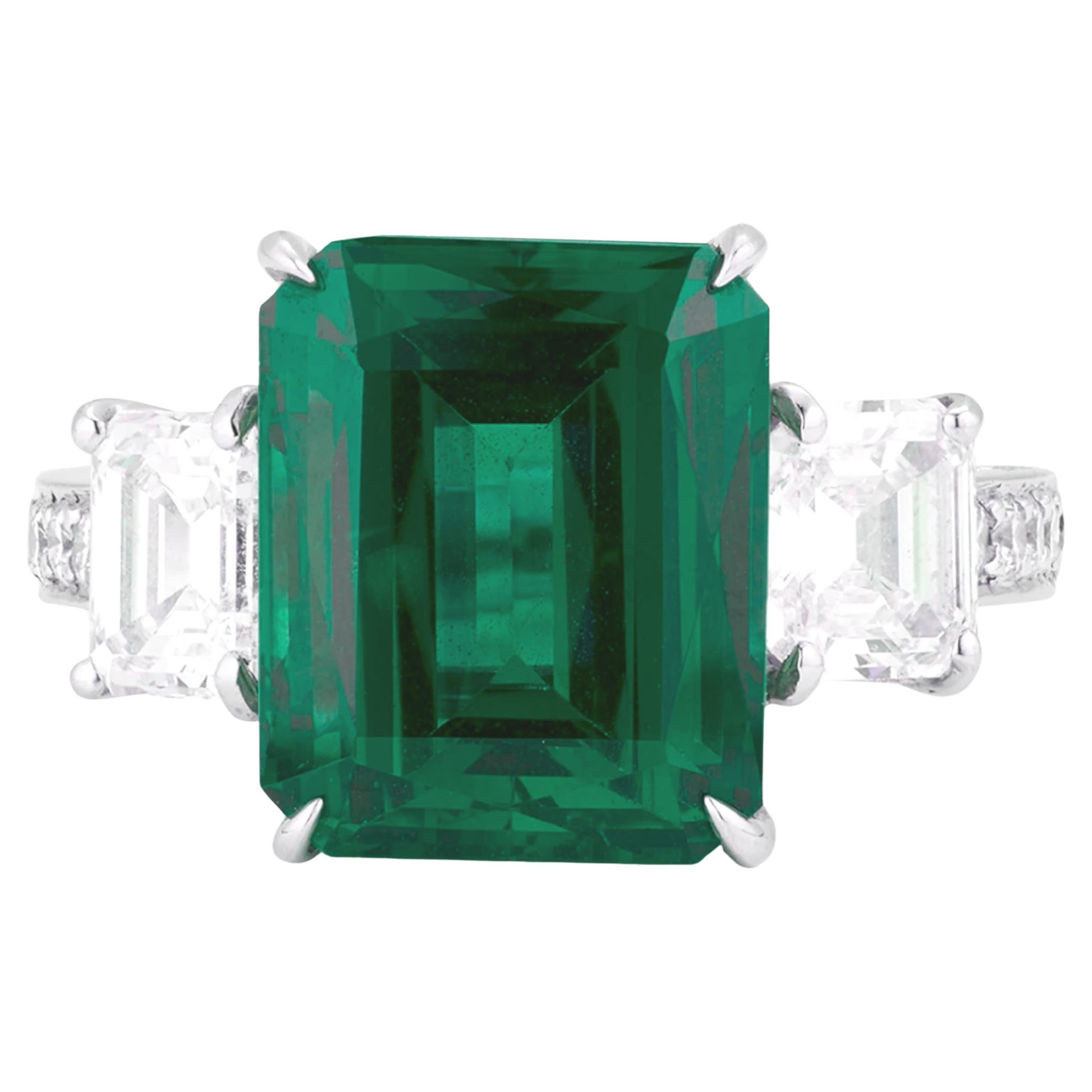 MINOR OIL GRS Certified vivid green  6.89 Carat Emerald Cut Diamond Ring