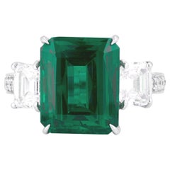 MINOR OIL GRS Certified vivid green  6.89 Carat Emerald Cut Diamond Ring