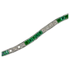 Bracciale tennis vintage con smeraldo e diamanti da 6,5 carati in platino