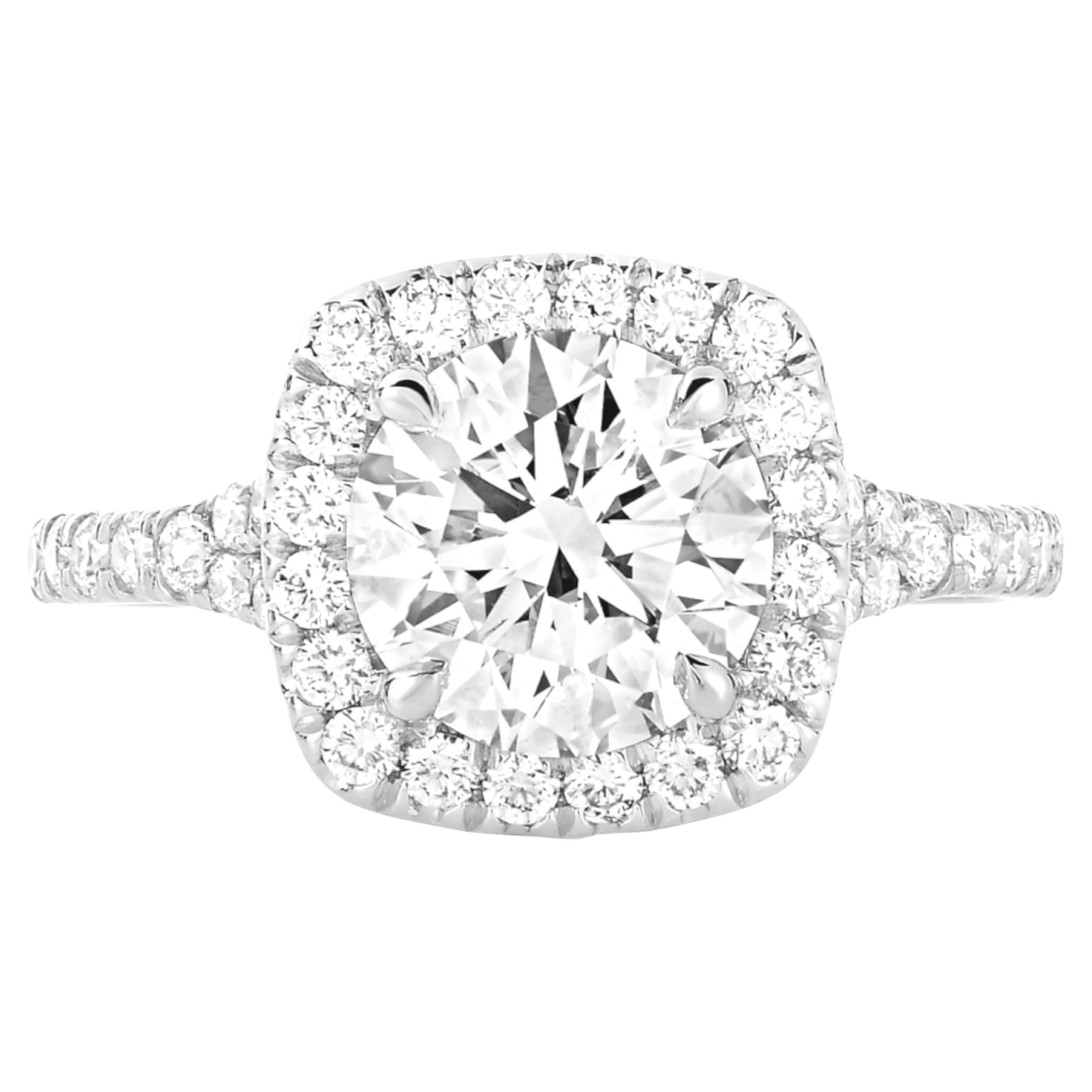 An exquisite 1.80-carat D color internally flawless round diamond, showcasing a stunning f color with exceptional clarity. This masterpiece features excellent polish and symmetry, ensuring it sparkles brilliantly from every angle. 

Set in a