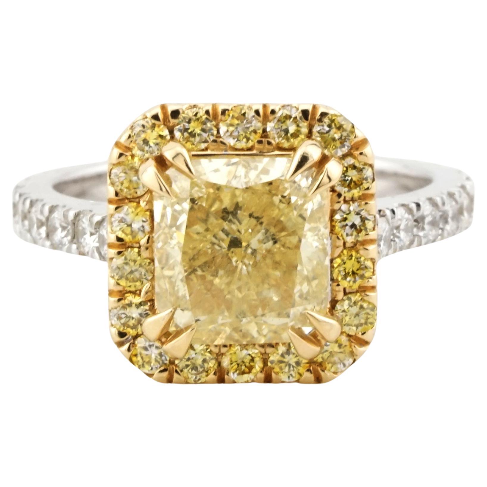 GIA Certified 2.05 Carat Radiant Cut Fancy Yellow Diamond Ring