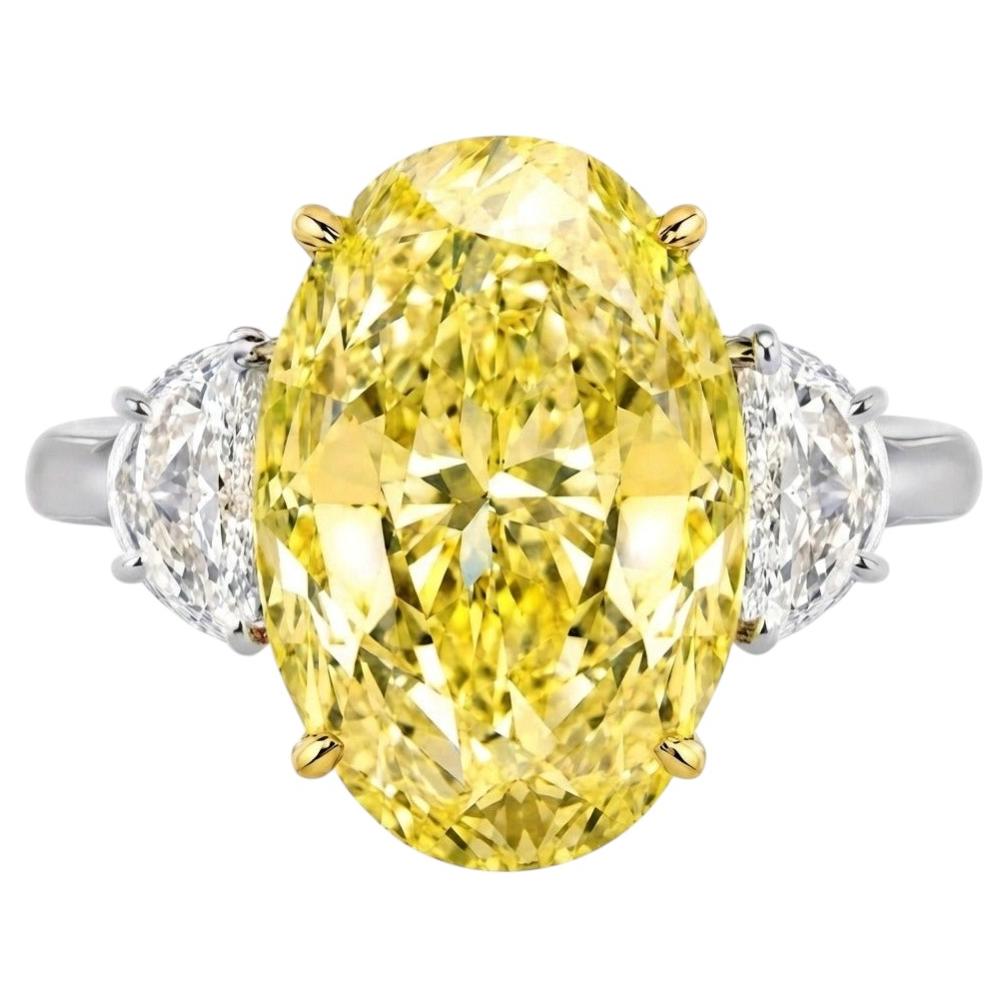 GIA Certified 7 Ct. Fancy Yellow Oval Cut Diamond Platinum Ring
