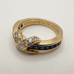 Tiffany & Co. Anello in oro giallo 18 carati con zaffiro e diamanti, modello X-Design