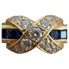 Tiffany & Co. Anello in oro giallo 18 carati con zaffiro e diamanti, modello X-Design
