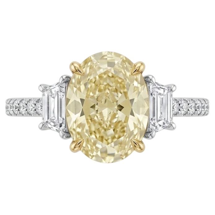 3 Carat Yellow Oval Modified Brilliant Diamond White and Yellow Gold Ring