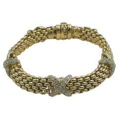 Pulsera Fope de oro amarillo de 18k con eslabones de malla y diamantes