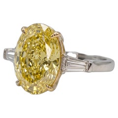6.1 Carat Fancy Yellow VVS1 Oval Diamond White and Yellow Gold Ring