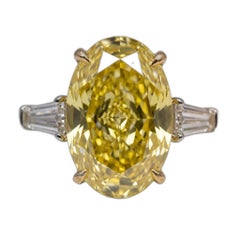 6.1 Carat Fancy Yellow VVS1 Oval Diamond White and Yellow Gold Ring