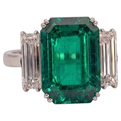 6.6 Carat vivid green Emerald and Diamond Platinum Ring