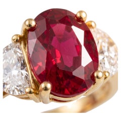 5 Carat vivid red oval Diamond Yellow Gold Ring