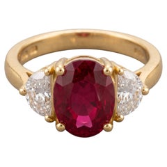 5 Carat vivid red oval Diamond Yellow Gold Ring