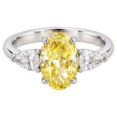 GIA Certified 1.20 Carat Fancy Yellow Oval Cut Diamond 18K Gold Ring