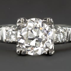 Art Deco Platinum Old European Cut Diamond and Baguette Engagement Ring