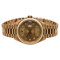 Rolex Datejust Armbanduhr aus 18 Karat Gelbgold mit Diamantzifferblatt