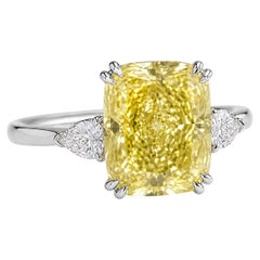 Bague avec diamant certifié GIA de 6,33 carats, de couleur jaune intense « Fancy », pureté VS1, taille « coussin »