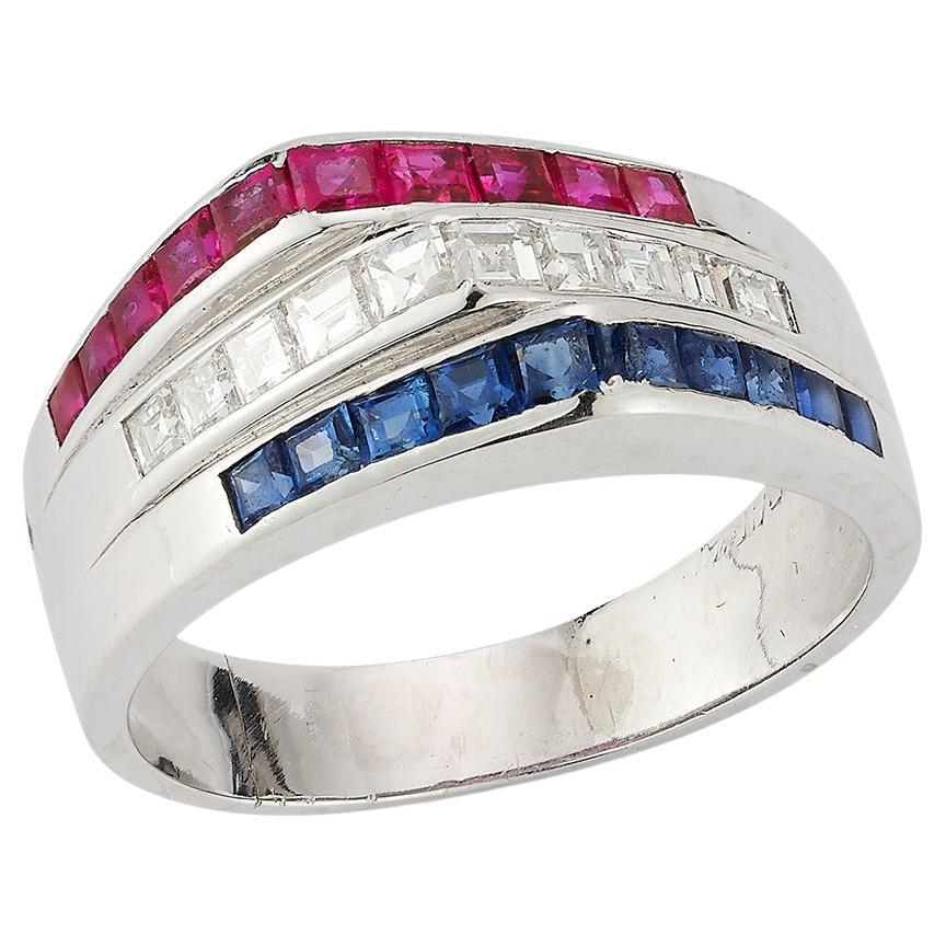 Anello Cartier "Americana" con rubino, zaffiro e diamanti