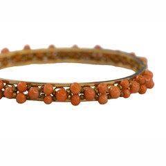 Yellow Gold Coral Bead and Filigree Bangle Bracelet