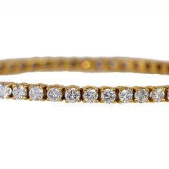 Pulsera tipo «tennis» de oro amarillo con diamantes redondos de talla brillante