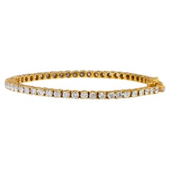 Pulsera tipo «tennis» de oro amarillo con diamantes redondos de talla brillante
