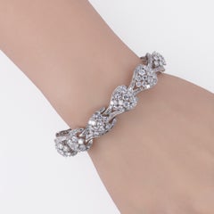 Bracelet imposant « Platinum Wave Scroll » à maillons en forme de diamant