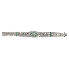 Platinum Art Deco Diamond and Calibre-Cut Emerald Geometric Bracelet