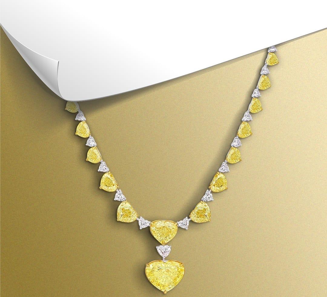 Introducing a creation that will never be repeated —
The LEGACY 80 Carat Fancy Intense Yellow Heart Diamond Necklace, composed entirely of GIA-certified Fancy Intense Yellow heart-shaped diamonds, is a once-in-a-lifetime statement of romantic power