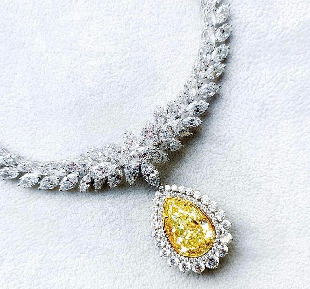 LEGACY 50  carat GIA Certified 12 Fancy Yellow Pear  D–F colour High Jewelry In New Condition For Sale In Mumbai, IN