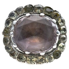 Portugiesischer Ring aus Gold und Silber des XVIII. Jahrhunderts mit Amethyst und Chrysolit